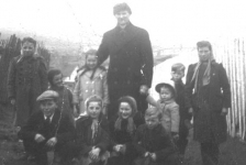 083: standing l-r Teresa Whelan, Rita Whelan, Mary Reddy, Fr Haverstrow, Anne Marie Barry,  Leo Barry, Marie Counsel; squatting, Cam Dunphy, Madonna Whelan, Gwen Carroll, Ray  Carroll. (circa 1948) [courtesy of Mary (Reddy) King]  - Teresa, Rita and Madonna daughters of Leo Whelan &amp;amp; Liz Bishop; Mary daughter of Michael  Reddy &amp;amp; Liz Moore; Cam son of Thomas Dunphy &amp;amp; Anne Carroll; Anne Marie daughter of Leo  Barry &amp;amp; Liz Ryan; Gwen, Ray and ? children of Michael Carroll &amp;amp; Josie Barry; Rosemary  daughter of William Whelan &amp;amp; Mary Carroll